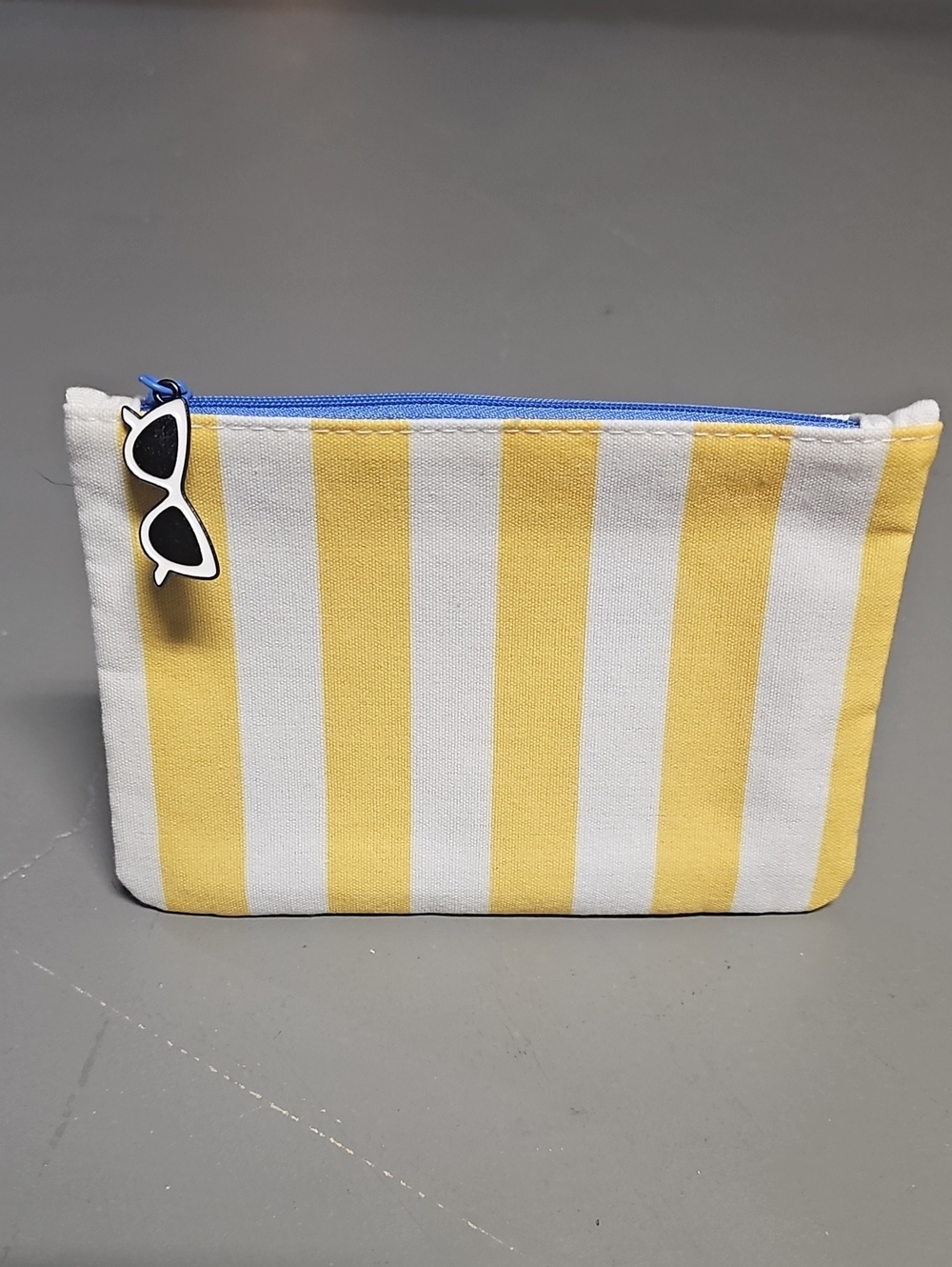 IPSY Glam Bag July 2026 Yellow & White Stripes Beach Theme